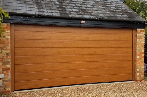 Hormann sectional garage door with woodgrain finish
