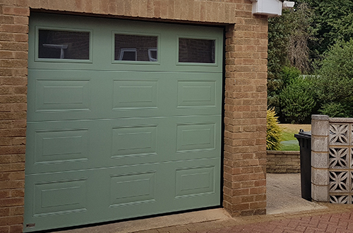 SWS Sectional Garage Door with Windows in Chartwell Green