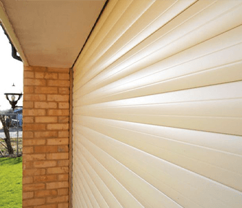 Insulated roller garage door
